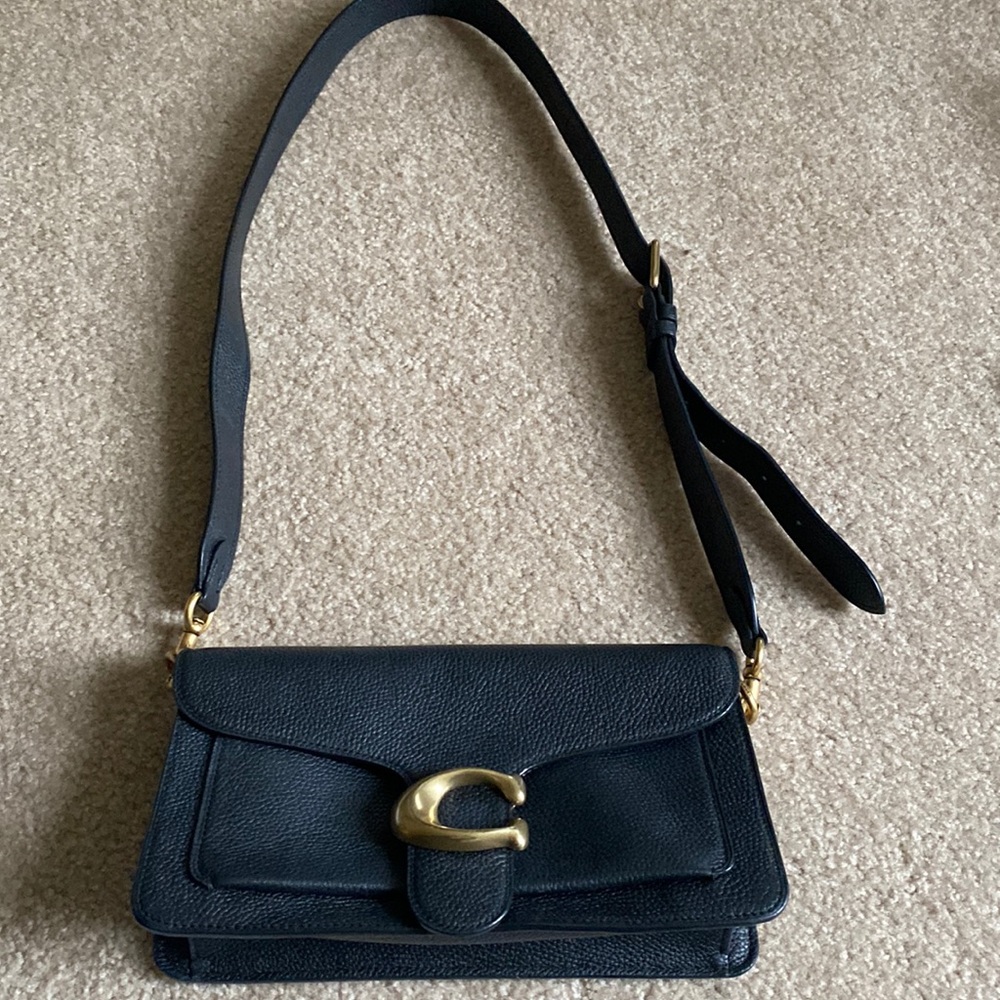 Coach Tabby 26 Black Pebble leather. Can be a clutch, shoulder or crossbody.